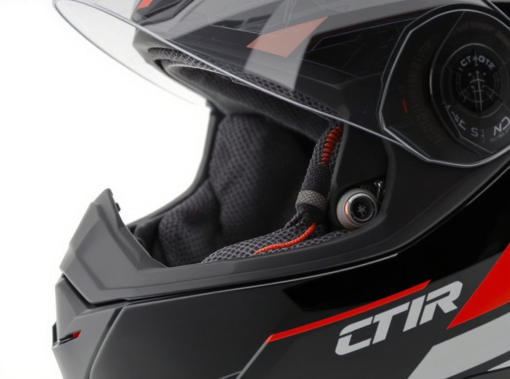 Comfortable earbud placement under motorcycle helmet design
