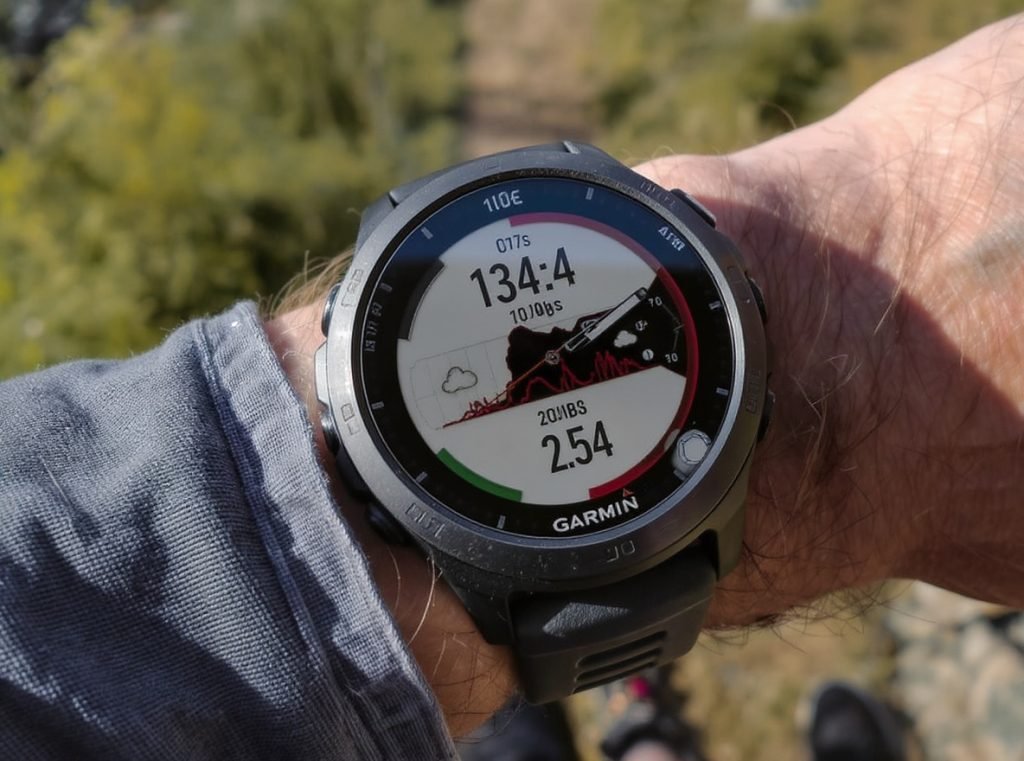 Garmin fitness watch showing data-rich customizable face with health metrics