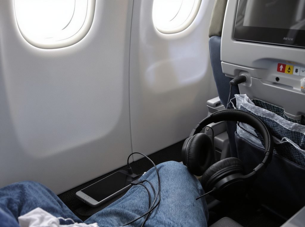 Wireless and wired headphone connectivity options for airplane travel